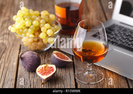 Cognac In Glass, Vintage Wood Background Stock Photo