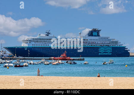 Big ship from a company Pullmantur, names Zenith, on a harbor a small Spanish town Palamos in Costa Brava. 10. 03. 2018 Spain Stock Photo