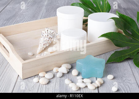 Various spa related objects on gray background, top view. Body and skin care Stock Photo