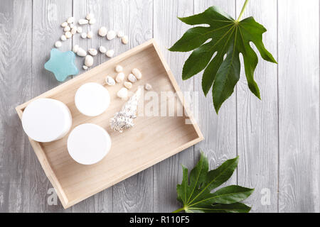 Various spa related objects on gray background, top view. Body and skin care Stock Photo