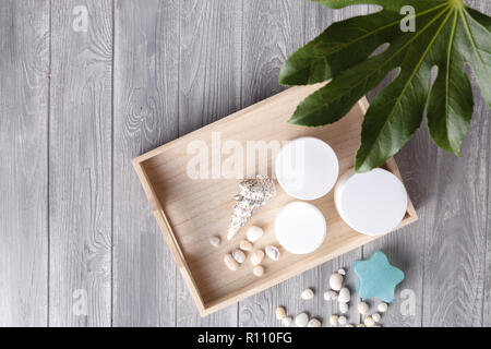 Various spa related objects on gray background, top view. Body and skin care Stock Photo