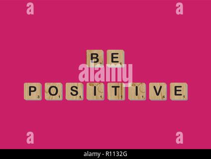 Scrabble tiles spells out   Motivational quote Scrabble Blocks Letters Pink Red Background Life quote Induce Alphabet Stock Vector