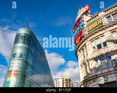 2 November 2018: Manchester, UK -  The Urbis building, home of the National Football Museum, and The Printworks, an entertainment venue, in Exchange S Stock Photo