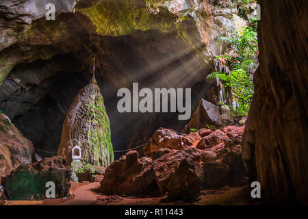 Light rays inside of the Sadan cave near Hpa-An in Myanmar
