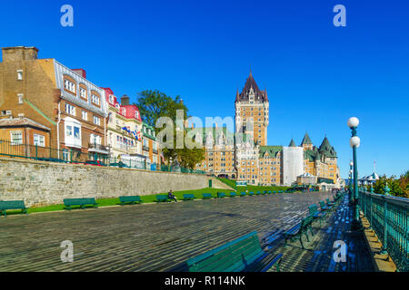 Quebec City, Canada - September 27, 2018: View of the Dufferin Terrace and the Chateau Frontenac, with locals and visitors, in Quebec City, Quebec, Ca Stock Photo