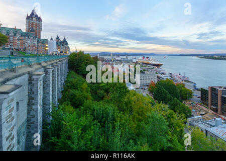 Quebec City, Canada - September 27, 2018: Sunset view of the Chateau Frontenac and the lower town, with locals and visitors, in Quebec City, Quebec, C Stock Photo