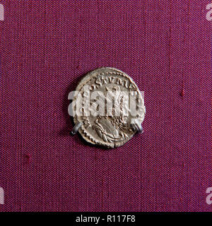 Man's profile on ancient coin Stock Photo