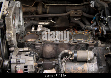 repair engine. disassembled cylinder block and timing chain. generator and starter Stock Photo