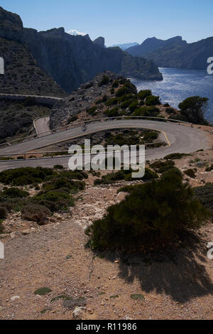 Winding road approaching the Far de Formentor lighthouse, Majorca, Balearic Islands, Spain. Stock Photo