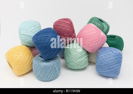 colored threads on the white background Stock Photo