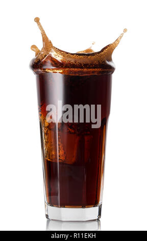 Splash in a faceted glass of cola Stock Photo