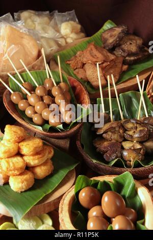 Perkedel, Sate Telur Puyuh, Babat Goreng, Sate Ati, Telur Bacem, and Kerupuk. Side dishes for Pindang Kudus. Stock Photo