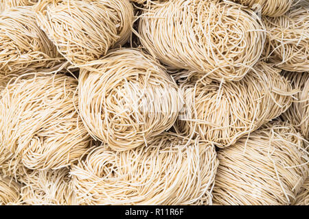 Food background - uncooked noodles Stock Photo