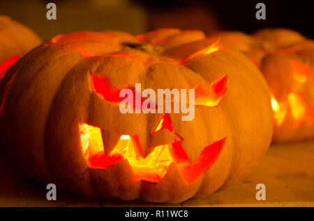 Halloween pumpkins with faces carved out Stock Photo