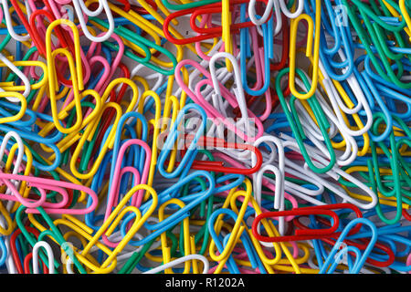 pile of colored office paper clips Stock Photo
