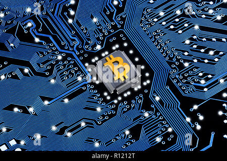 Printed circuit board with a processor and a bitcoin symbol. The concept of the mining of crypto-currency. Stock Photo