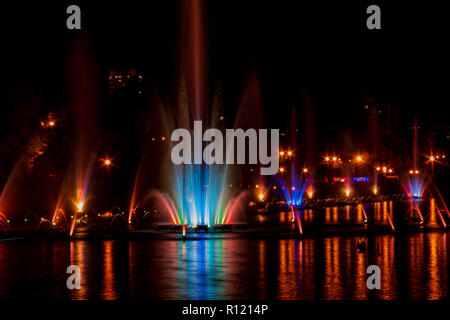 Glowing multicolored illumination fountains in the Far Eastern city of Khabarovsk. Stock Photo