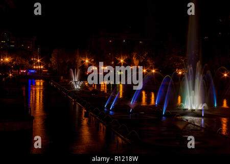 Glowing multicolored illumination fountains in the Far Eastern city of Khabarovsk. Stock Photo