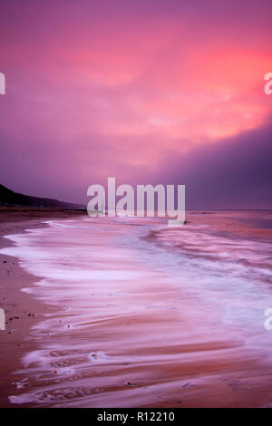 A brief moment of colour as the storm starts to move away. Shot at dawn. Stock Photo