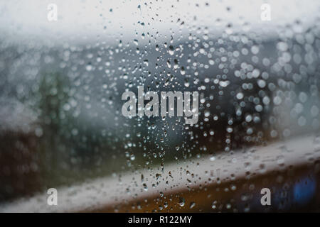 Raindrops on glass pane Stock Photo
