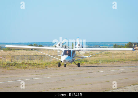 Light plane on the runway Stock Photo