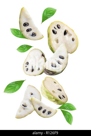 Flying cherimoyas (sugar apple) isolated on white background with shadow. Clipping path. Stock Photo
