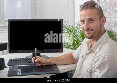 man video editor using a graphic tablet Stock Photo