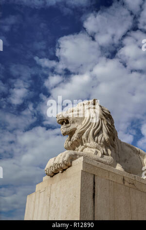 White lion statue in Lisbon Stock Photo