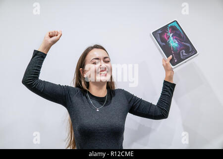 Barcelona, Spain - November 07, 2018: Woman holding a new iPad Pro Stock Photo