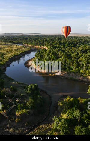Air balloon floating over Mara River, Kenya Stock Photo