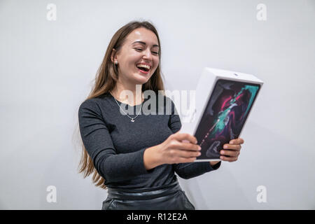 Barcelona, Spain - November 07, 2018: Woman holding a new iPad Pro Stock Photo
