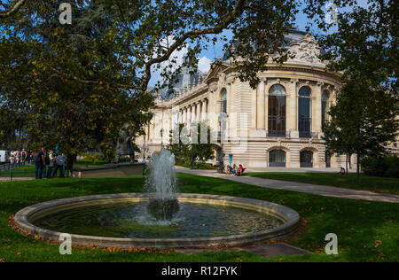 PARIS, FRANCE, SEPTEMBER 5, 2018 - A glimpse of Petit Palais (Big Palace) from the gardens with the fountain in Paris, France Stock Photo