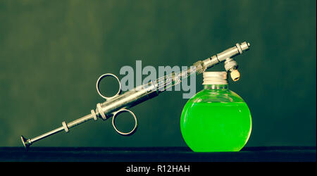 Syringe and bottle Stock Photo