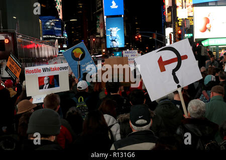 New York, NY, USA. 08 Nov., 2018. Thousands of protesters rallied in Times Square on 8 November 2018, in a national anti-Trump ‘emergency protest’ and called for the protection of special counsel Robert Mueller’s investigation, in the wake of US President Donald Trump firing of Attorney General JEFF SESSIONS and the possible illegal appointment of loyalist MATHEW WHITAKER as Acting Attorney General. The rally was followed by a march to Union Square. © 2018 G. Ronald Lopez/DigiPixsAgain.us/Alamy Live News Stock Photo