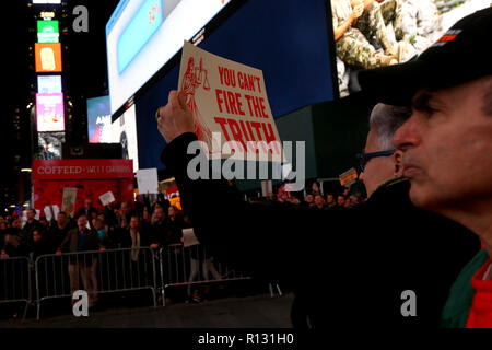 New York City, New York, USA. 8th Nov, 2018. Thousands of protesters rallied in Time Square on 8 November 2018, in a national anti-Trump ''˜emergency protest' and called for the protection of special prosecutor Robert Muller's investigation, in the wake of US President Donald Trump firing of Attorney General JEFF SESSIONS and the possible illegal appointment of loyalist MATHEW WHITAKER as Acting Attorney General. The rally was followed by a march to Union Square. Credit: G. Ronald Lopez/ZUMA Wire/Alamy Live News Stock Photo