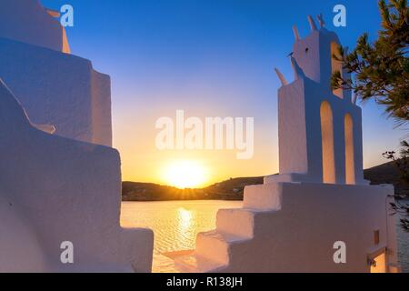The famous old church of Agia Irini, at the entrance of Yalos, the port of Ios island, Cyclades, Greece. Stock Photo