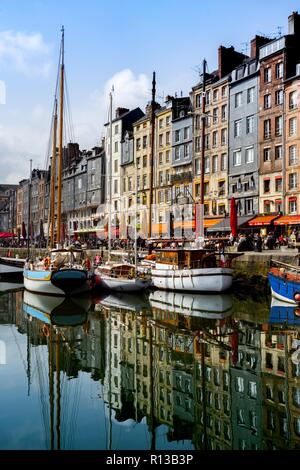 HONFLEUR, FRANCE - APRIL 8, 2018: view of the bay and the embankment  in the famous French city Honfleur. Normandy, France Stock Photo