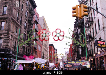 Summer decorations at Feast of San Gennaro festival on Mulberry Street in Little Italy, New York, NY, USA Stock Photo