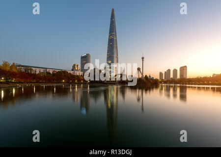 Autumn landscape at lotte world in morning in Seoul city, South Korea. Stock Photo
