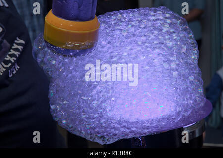 Foam show . Soap bubble trick . Soap bubbles on a children's holiday. Show with soap bubbles . Show with bubbles. Stock Photo