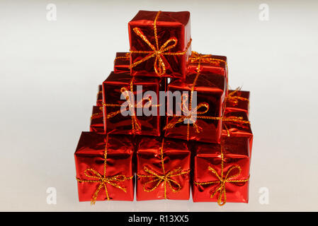 A pile of brightly wrapped gifts suitable for Christmas, a birthday, anniversary or any celebration. Stock Photo