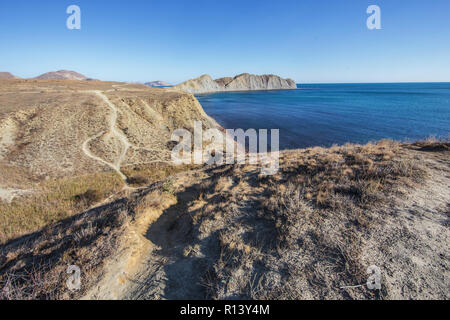 Blue sea lagoon and rocky mountains. Closeup. Stock Photo