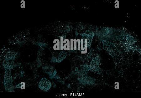 Abstract grunge cellular background against black Stock Photo