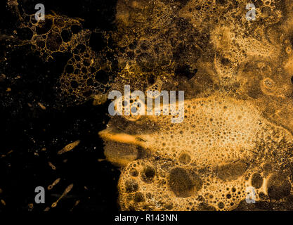 Abstract grunge cellular background against black Stock Photo