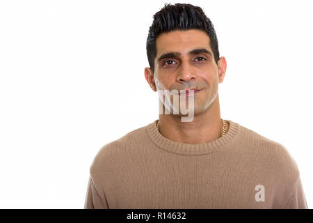 Studio shot of young muscular Persian man Stock Photo