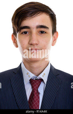 Face of young handsome Persian teenage businessman Stock Photo