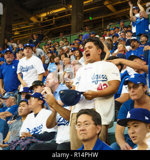 Los Angeles Dodgers celebrate in the lockerroom after beating the Atlanta  Braves in Game 4 of the National League Division Series at Dodger Stadium  in Los Angeles on October 7, 2013. The