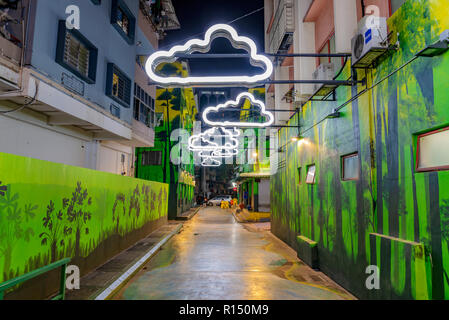 KUALA LUMPUR, MALAYSIA - JULY 23: Alley with Colorful street art on the Lost Stream of Jalan Alor at night on July 23, 2018 in Kuala Lumpur Stock Photo