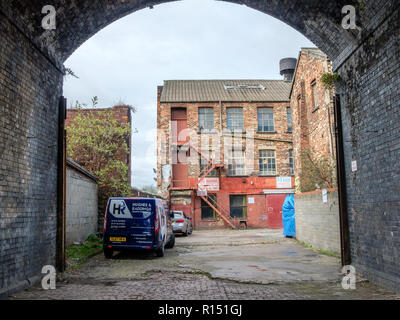 Old factory buildings in the vicinity of Granary Wharf in the city centre of Leeds, which is the largest town in West Yorkshire. Stock Photo