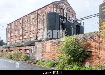 Old factory buildings in the vicinity of Granary Wharf in the city centre of Leeds, which is the largest town in West Yorkshire. Stock Photo